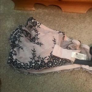 Pretty pink and black bra.